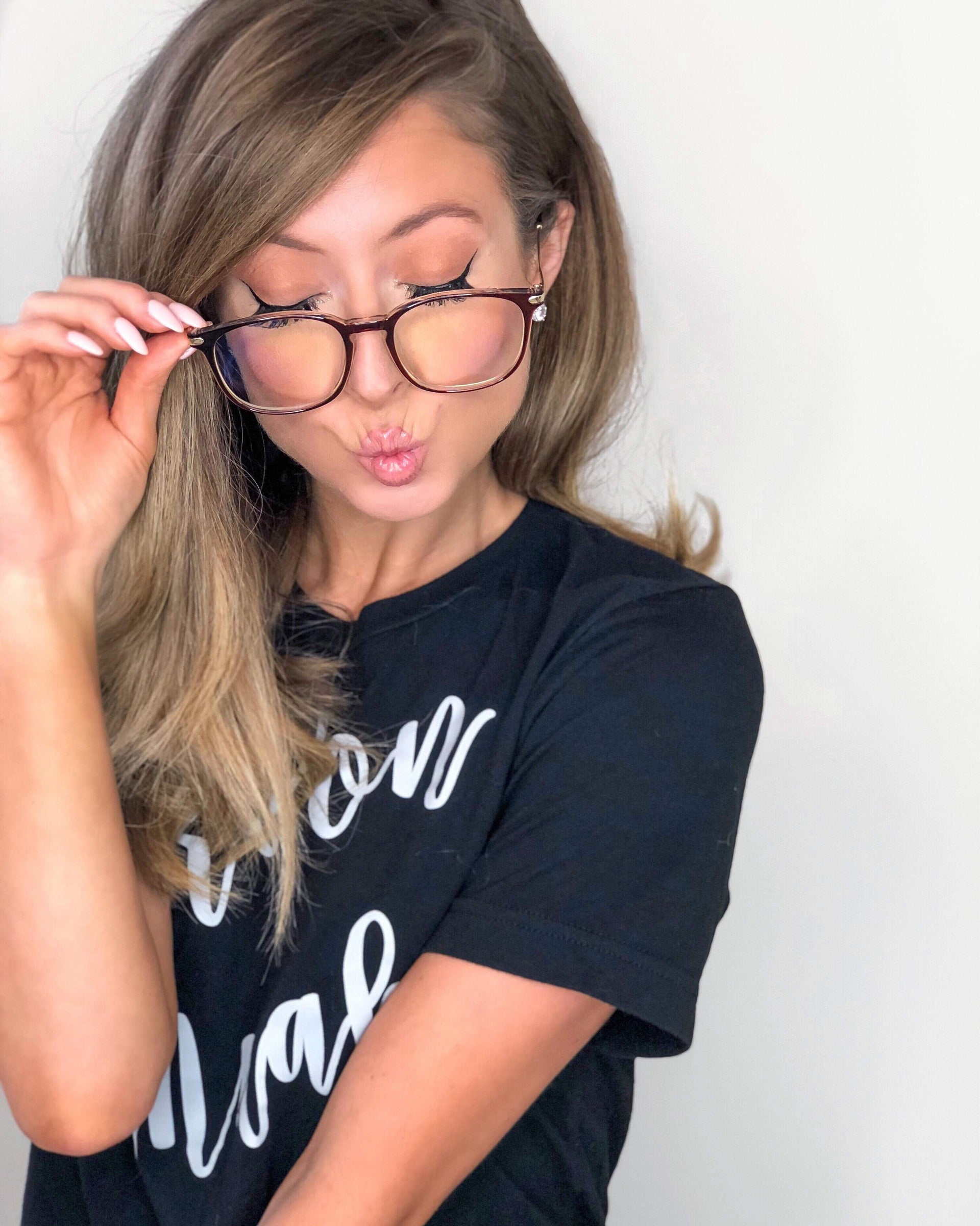 Woman wearing dark rose LadyBoss glasses