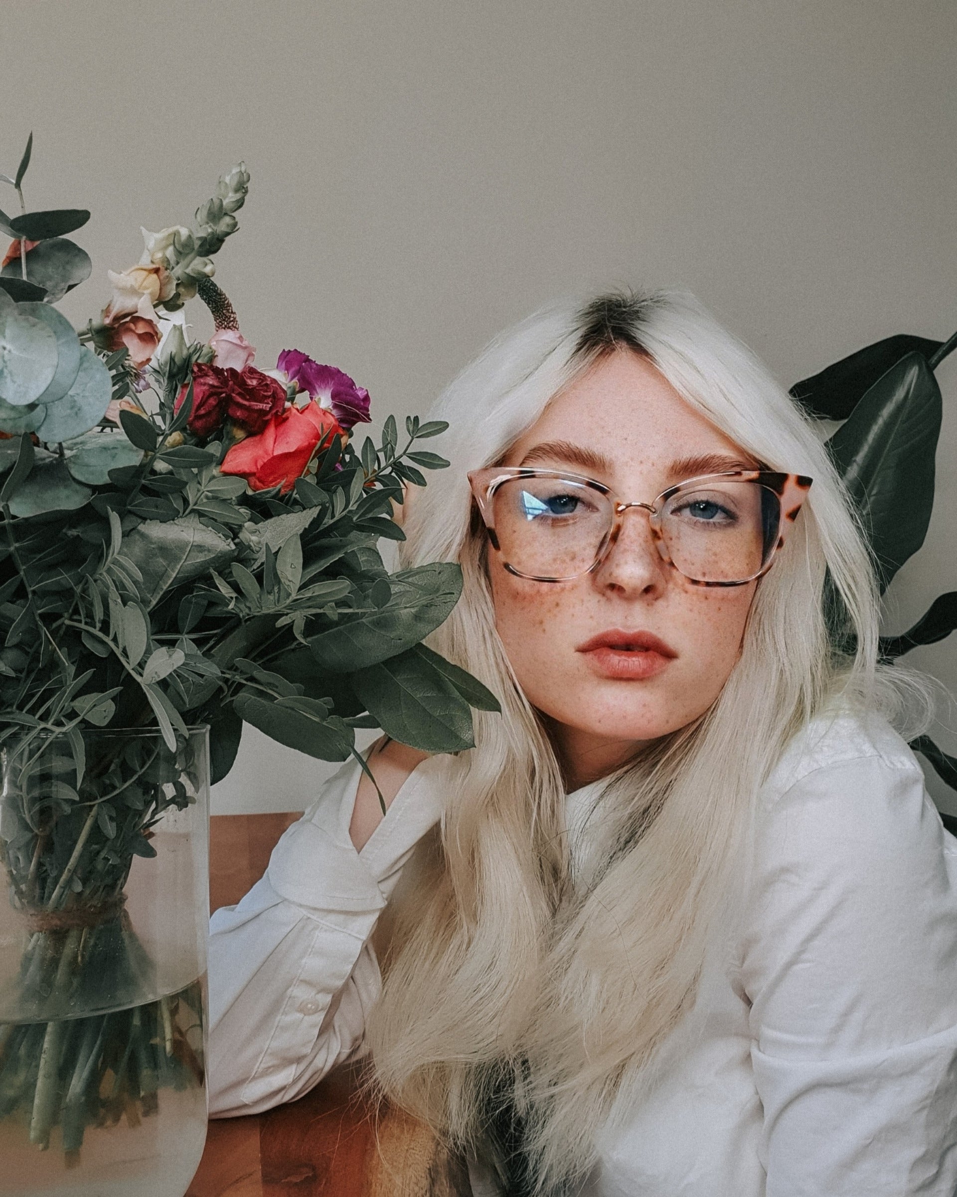 Woman wearing pink leopard LadyBoss glasses