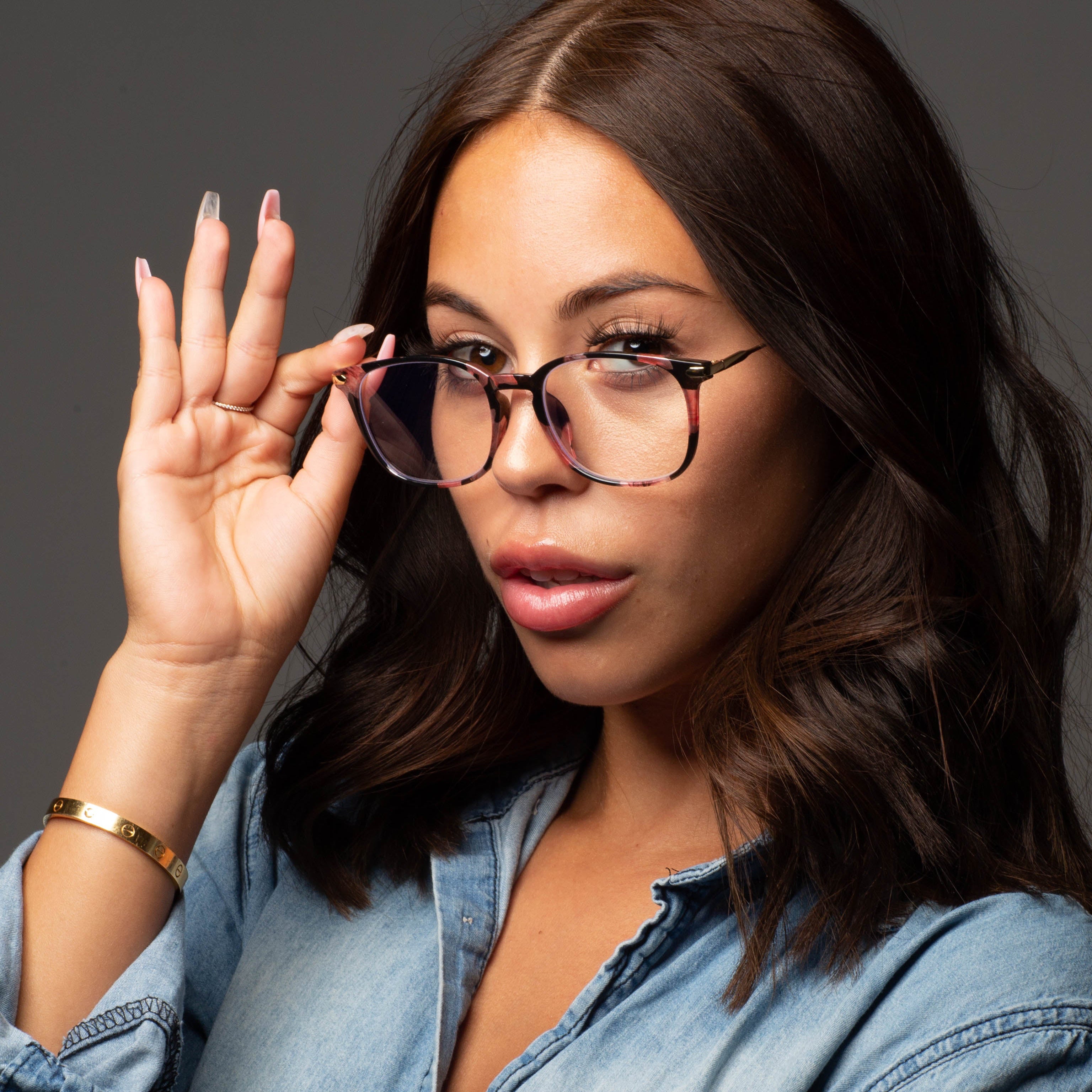 Model wearing LadyBoss Classics eyeglasses in Floral #frame color_floral