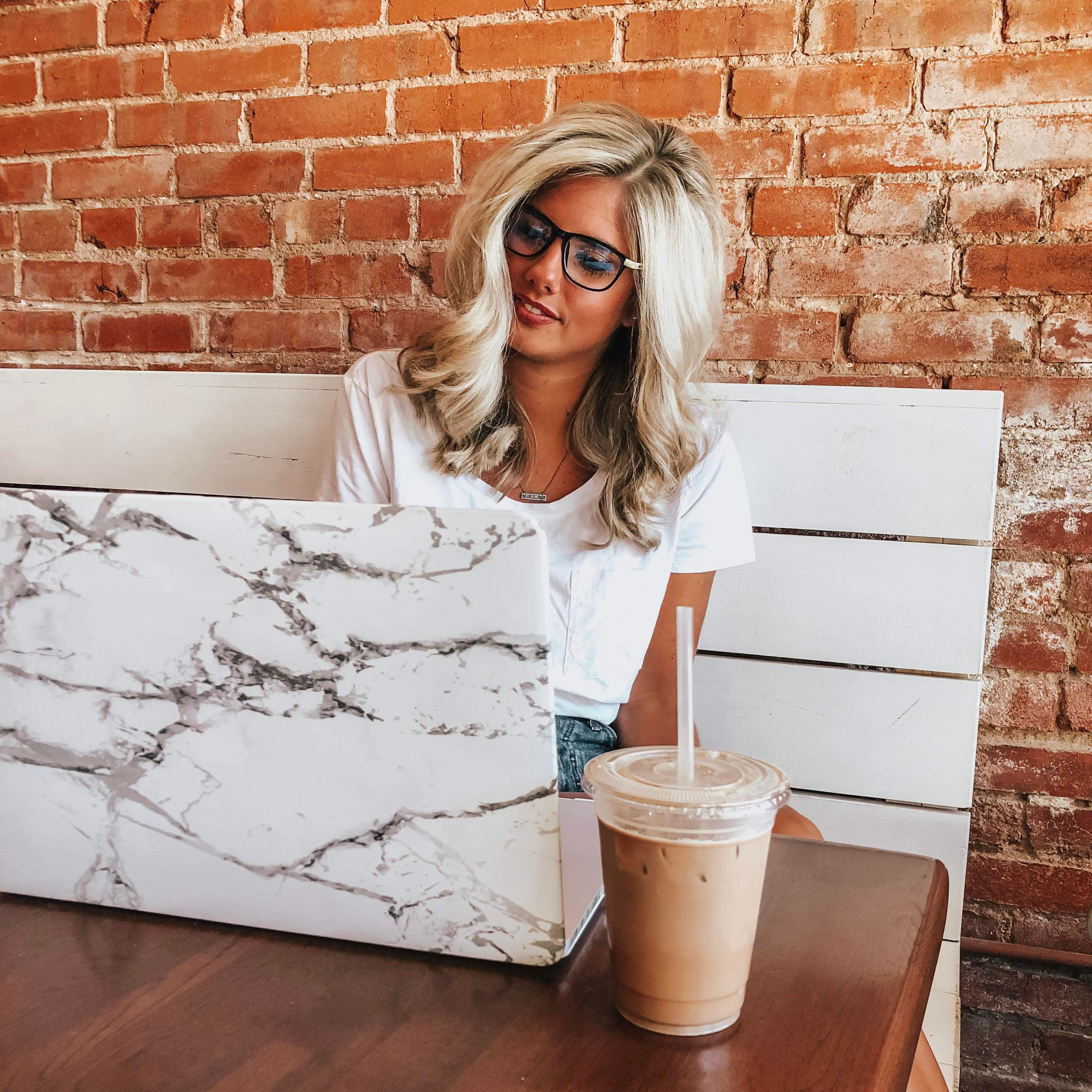 Model wearing LadyBoss Dimensions eyeglasses in Black #frame color_black