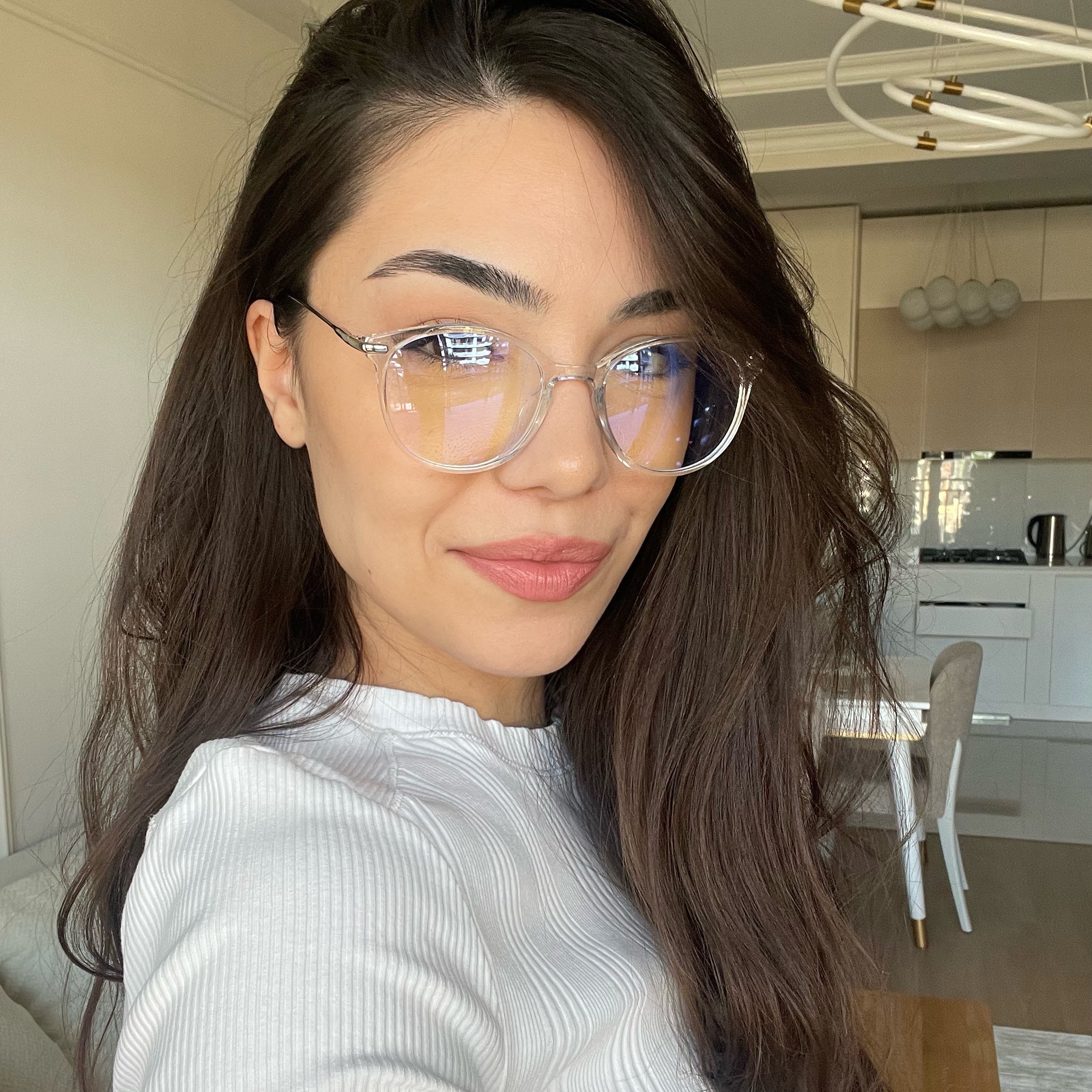 Model wearing LadyBoss Icons eyeglasses in Clear & Silver Metal #frame color_clear & silver metal