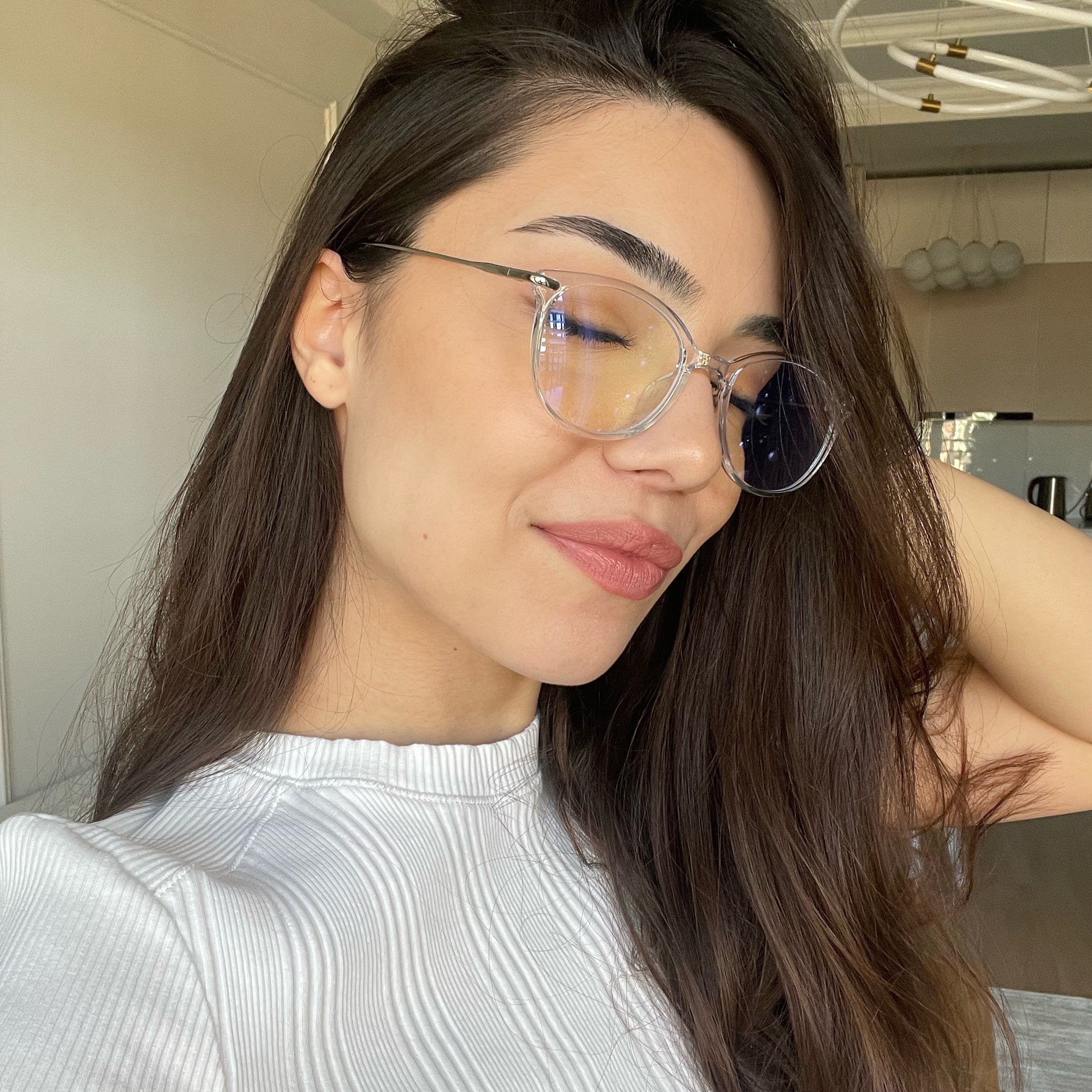 Model wearing LadyBoss Icons eyeglasses in Clear & Silver Metal #frame color_clear & silver metal