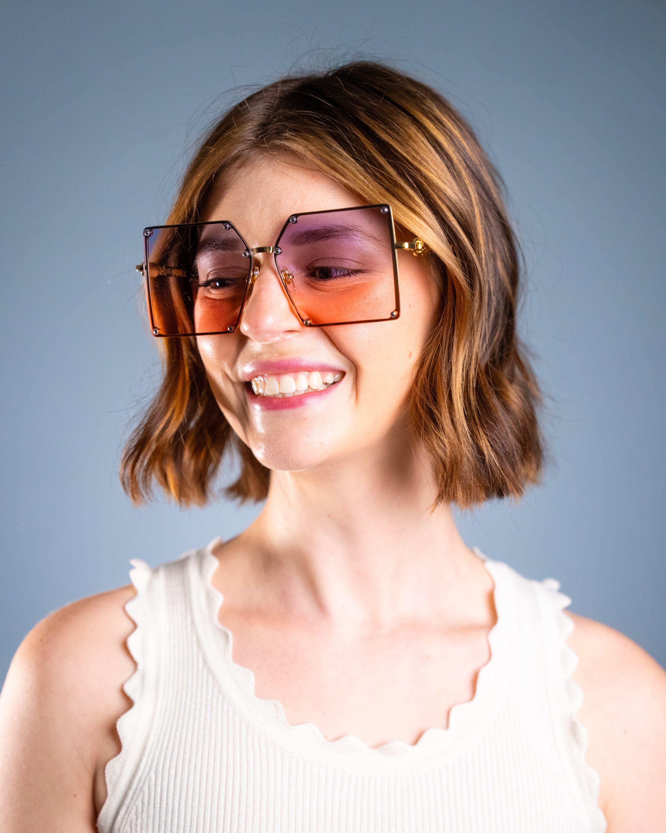 Model wearing LadyBoss Elevations sunglasses in Powder Blue, front view #frame color_powder blue