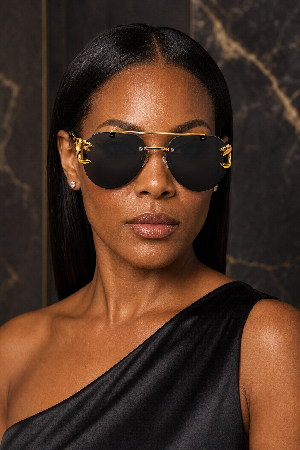 Lifestyle photo of LadyBoss Indiscretions sunglasses in Black & Gold, worn front view