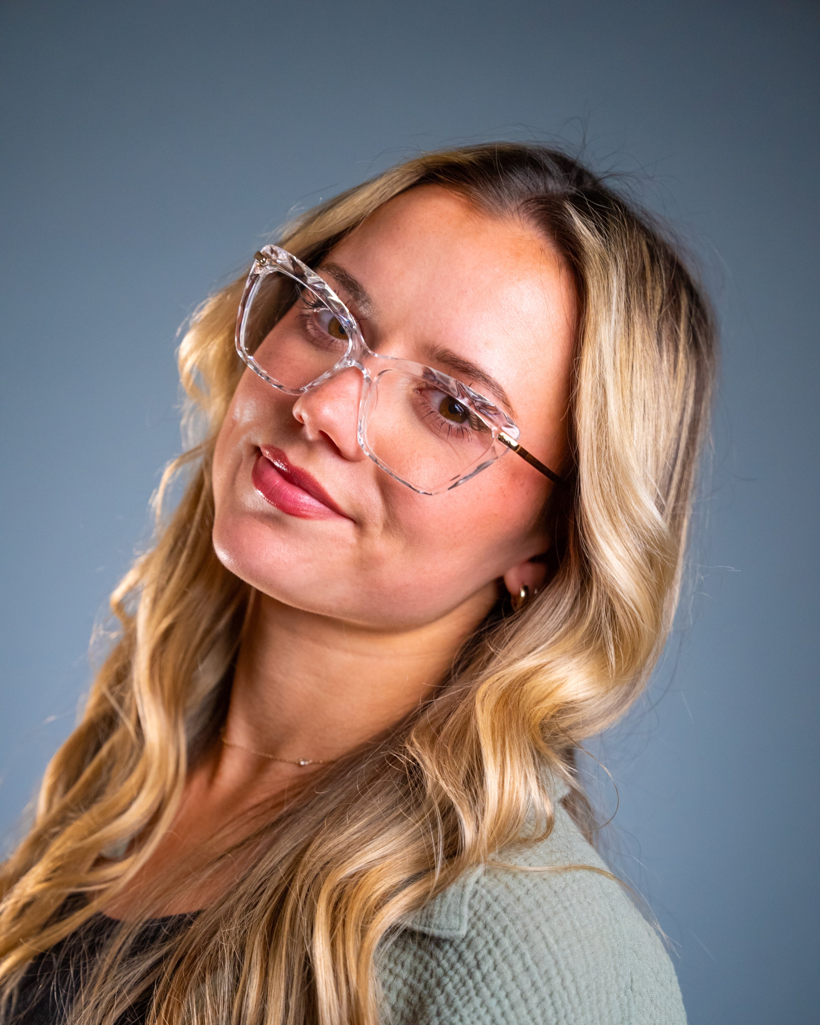 Model wearing LadyBoss Savants eyeglasses in Crystal Clear #frame color_crystal clear