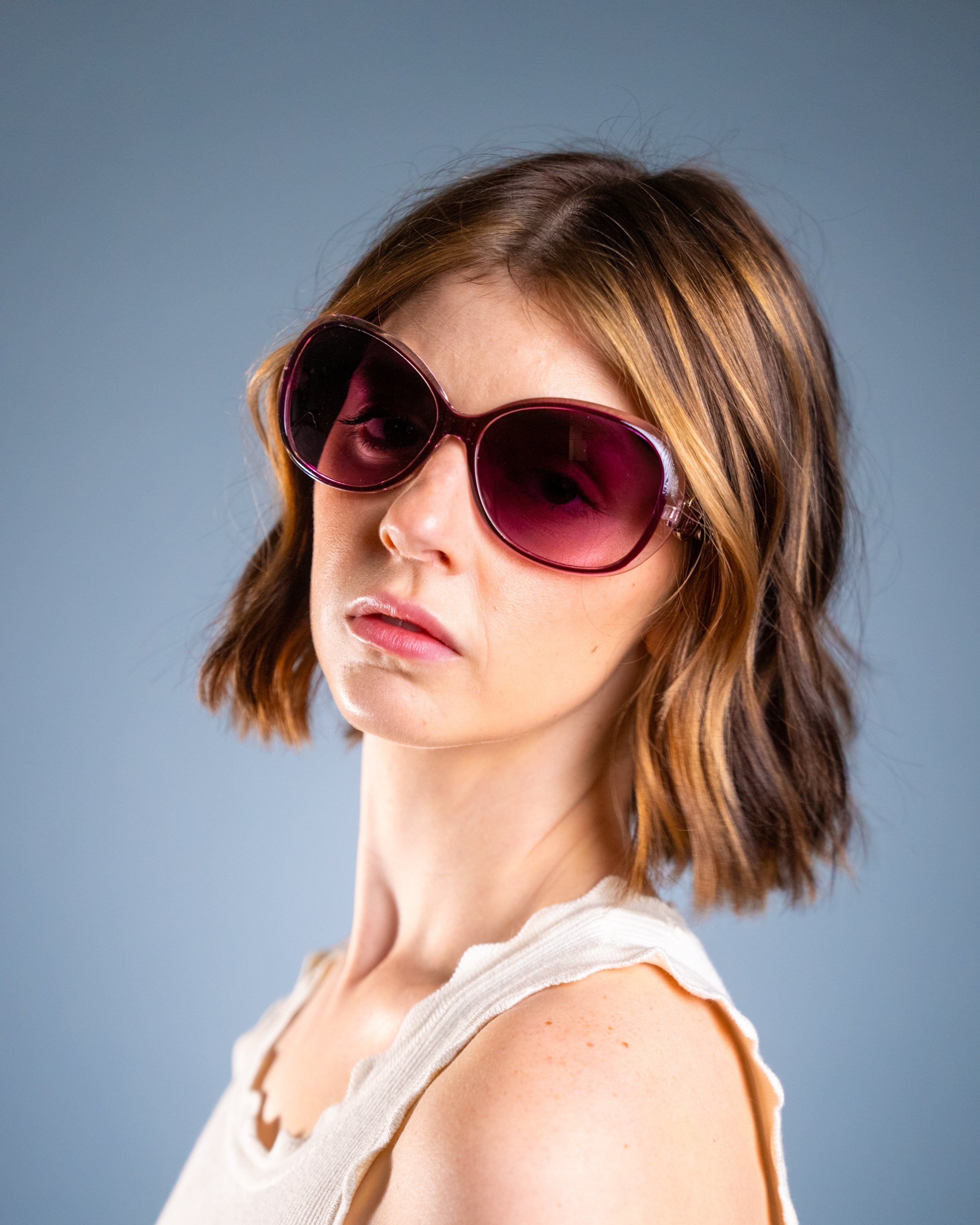 Model wearing LadyBoss Spectacles sunglasses in Violet #frame color_violet