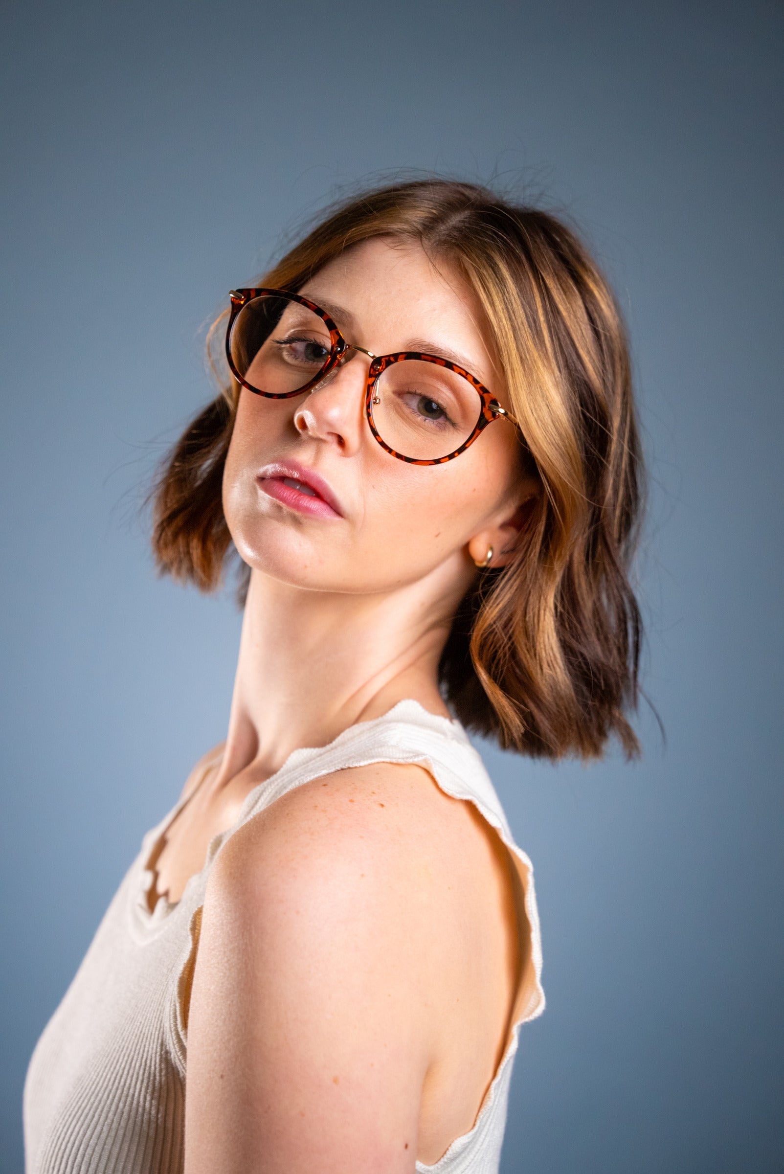 Woman wearing leopard LadyBoss glasses