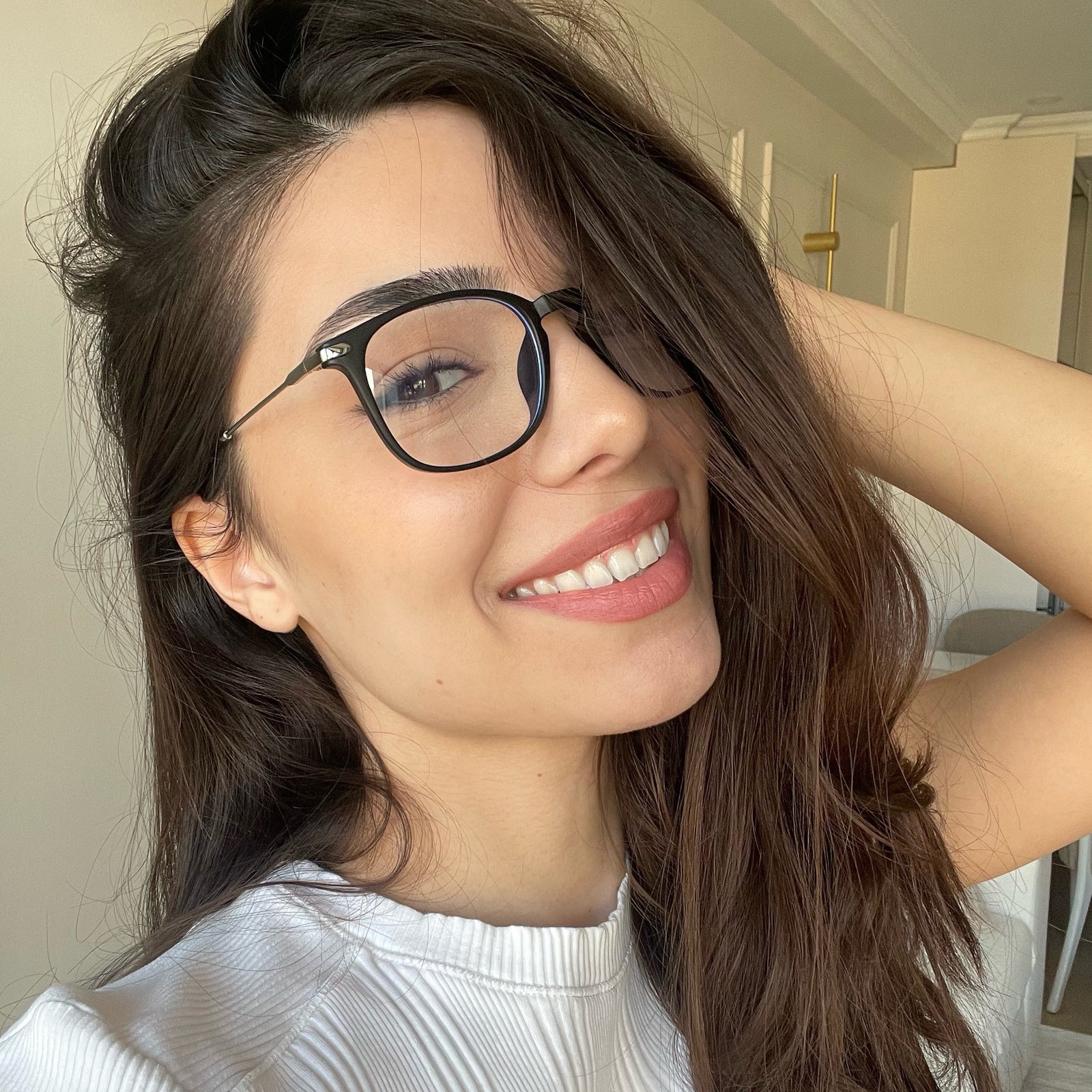 Model wearing LadyBoss Classics eyeglasses in Matte Black & Silver Metal