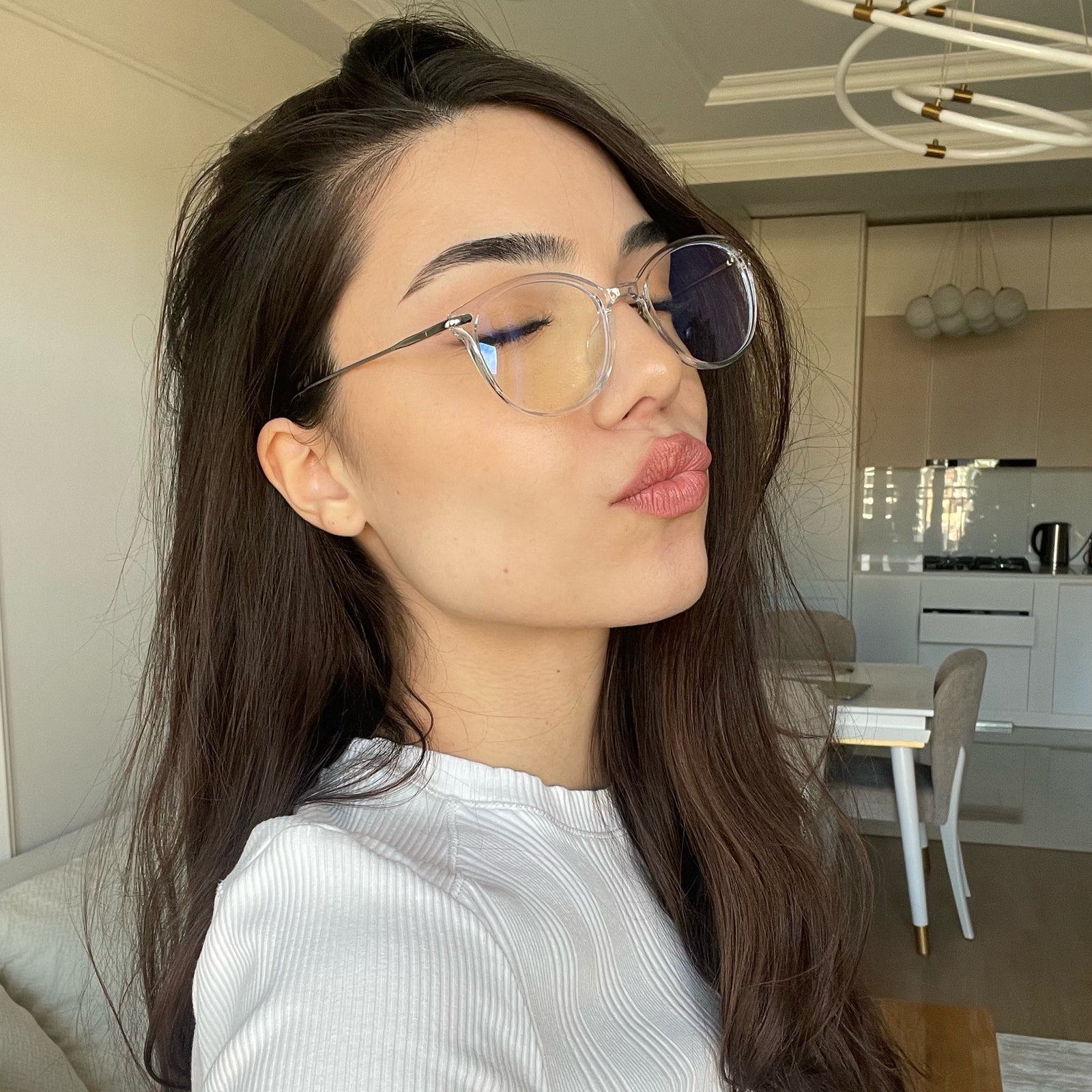 Model wearing LadyBoss Icons eyeglasses in Clear & Silver Metal
