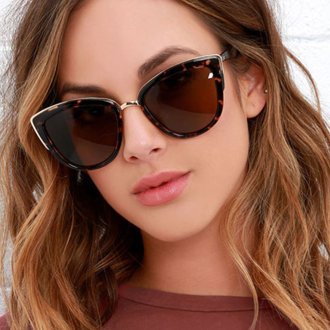 Model wearing LadyBoss Mavens sunglasses in Leopard #frame color_leopard
