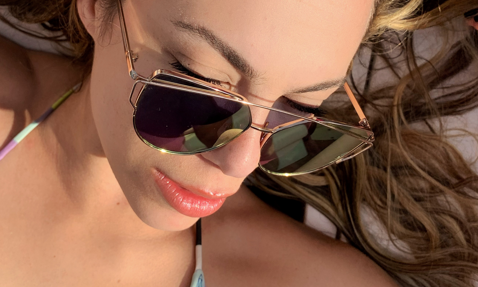 Model wearing LadyBoss Goldens sunglasses in Black