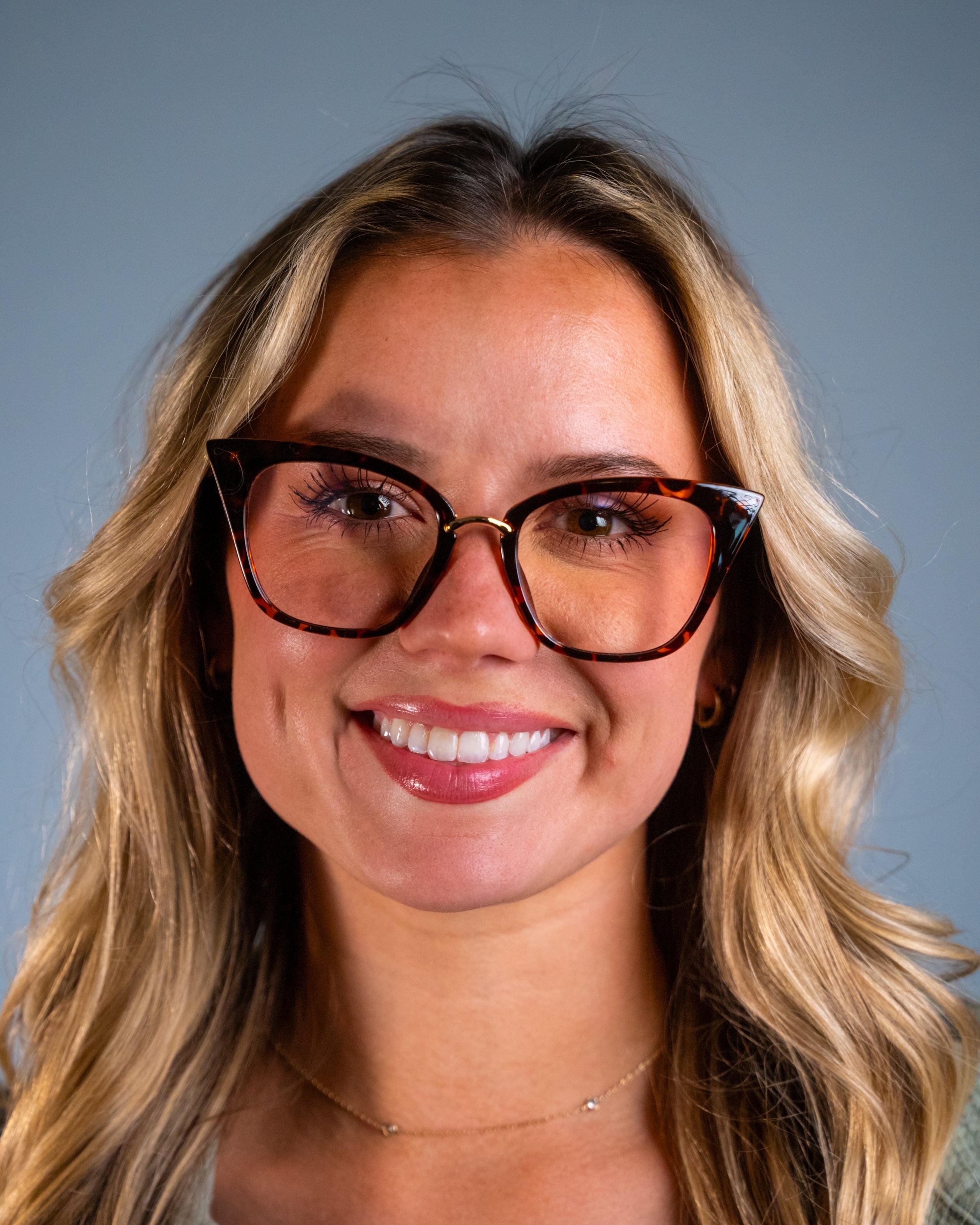 Model wearing LadyBoss Ethereals eyeglasses in Leopard #frame color_leopard