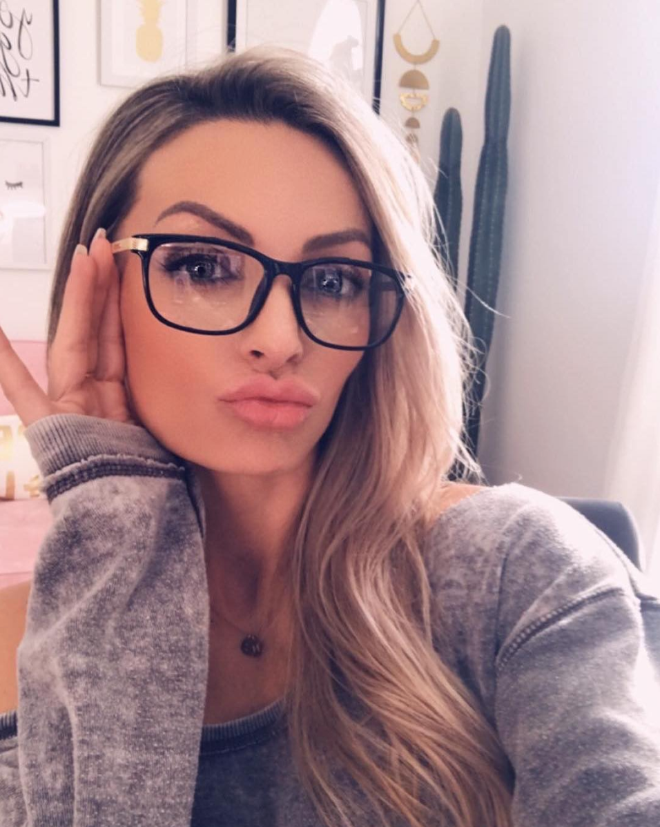 Model wearing LadyBoss Dimensions eyeglasses in Black #frame color_black