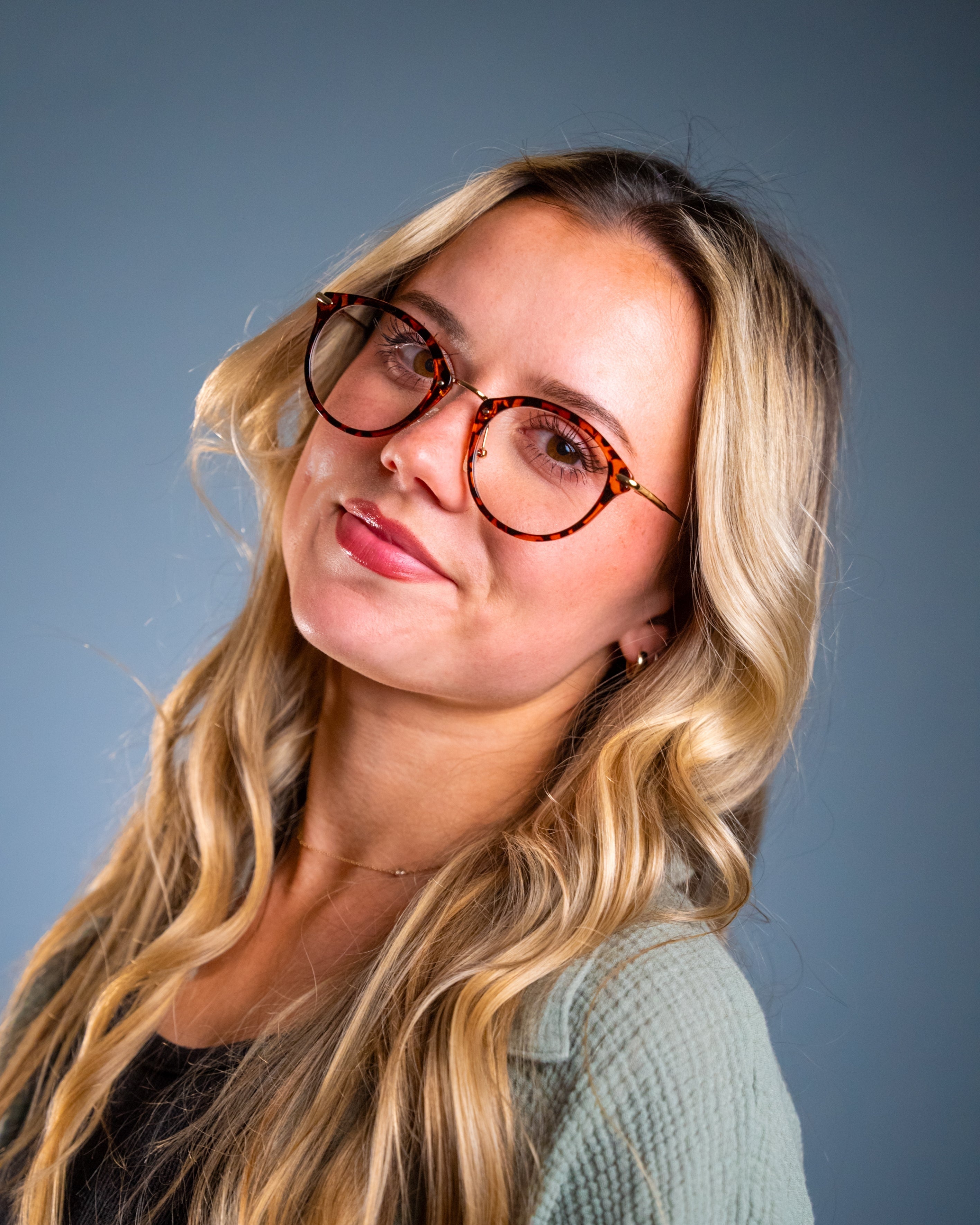 Model wearing LadyBoss Visionaries eyeglasses in Leopard #frame color_leopard