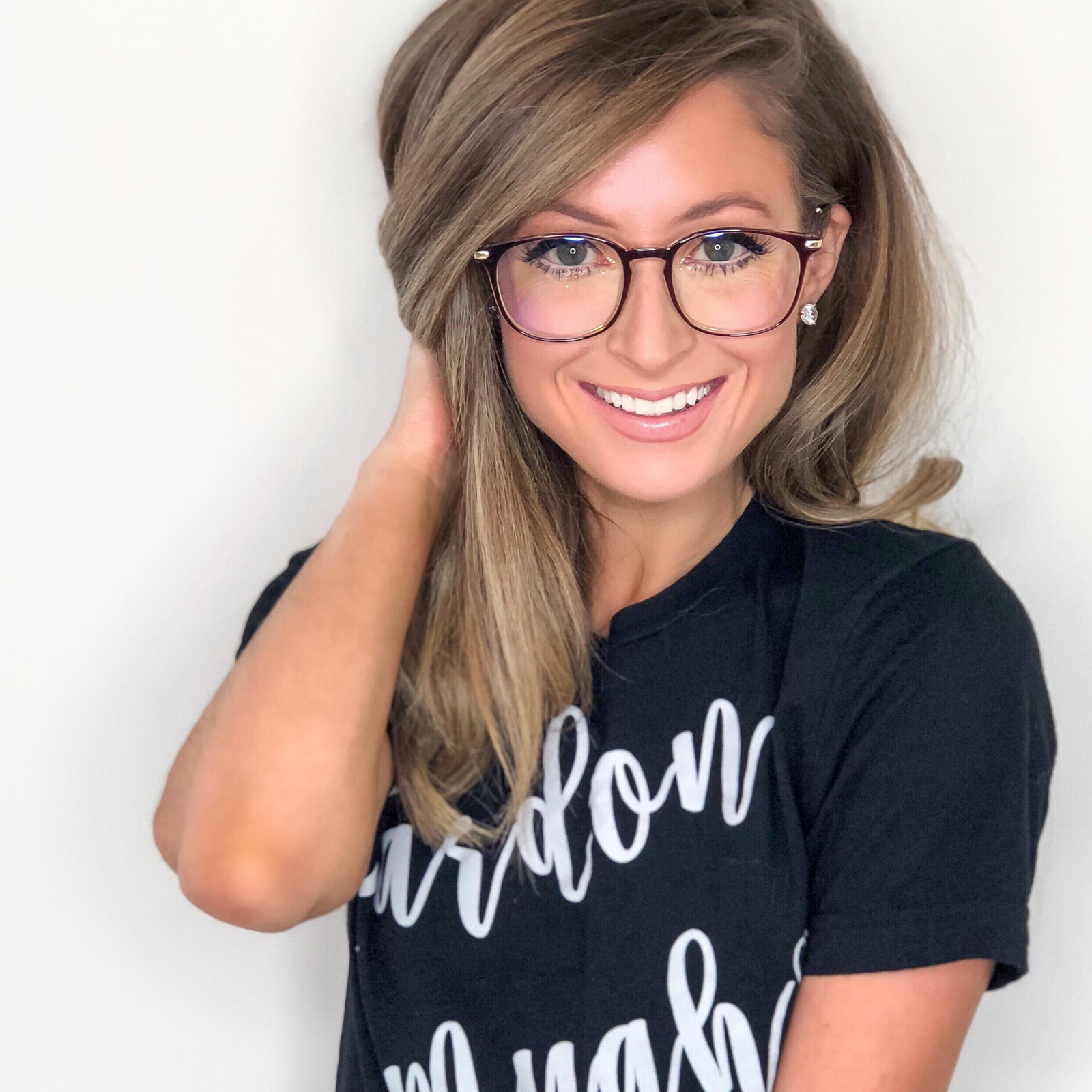 Model wearing LadyBoss Classics eyeglasses in Dark Rose