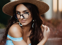 Load image into Gallery viewer, Woman wearing stylish blue light glasses.
