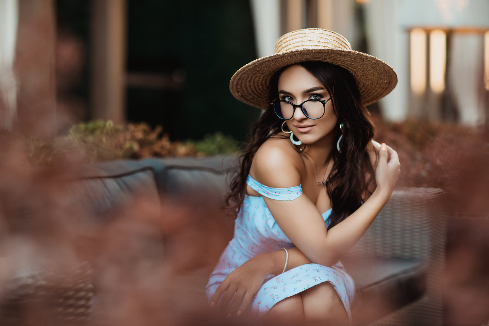 Woman wearing black LadyBoss glasses
